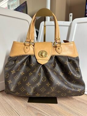 Louis Vuitton  Boetie PM Handbag Monogram Coated Canvas vachetta leather trim